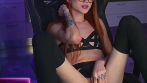 Redhead Skinny Russian Tattooed ladyman In Glasses Strokes Her Girly penis On cam
