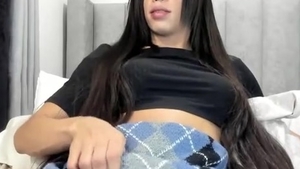 lengthy black Hair Transgirl Tugs Her giant knob On web camera