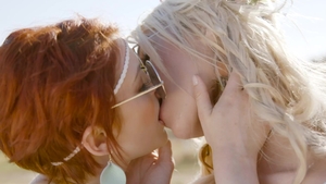 Transfixed: Lovers Stroll Through Sunlit Fields
